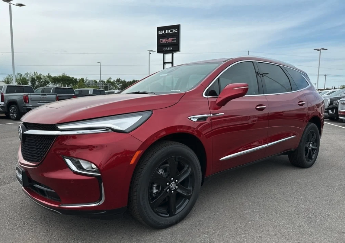 Red Buick SUV parked on the lot at Crain Buick GMC in Conway, Arkansas, ready for summer adventures